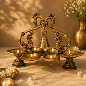 Mayura Pancha Deepa - Handcrafted Brass Five-Flame Oil Lamp · Double Peacock Arch · Suspended Bell · Antique Gold - Kanasu Artifacts